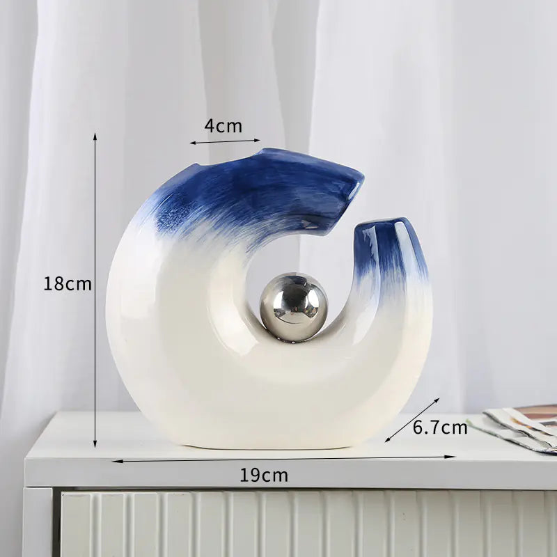 Decorative vase with measurements on a white surface