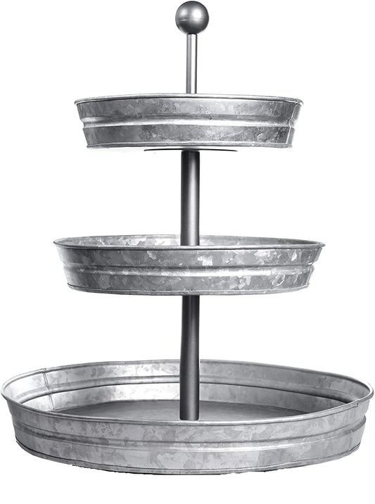 Three-tiered metal tray stand on a white background