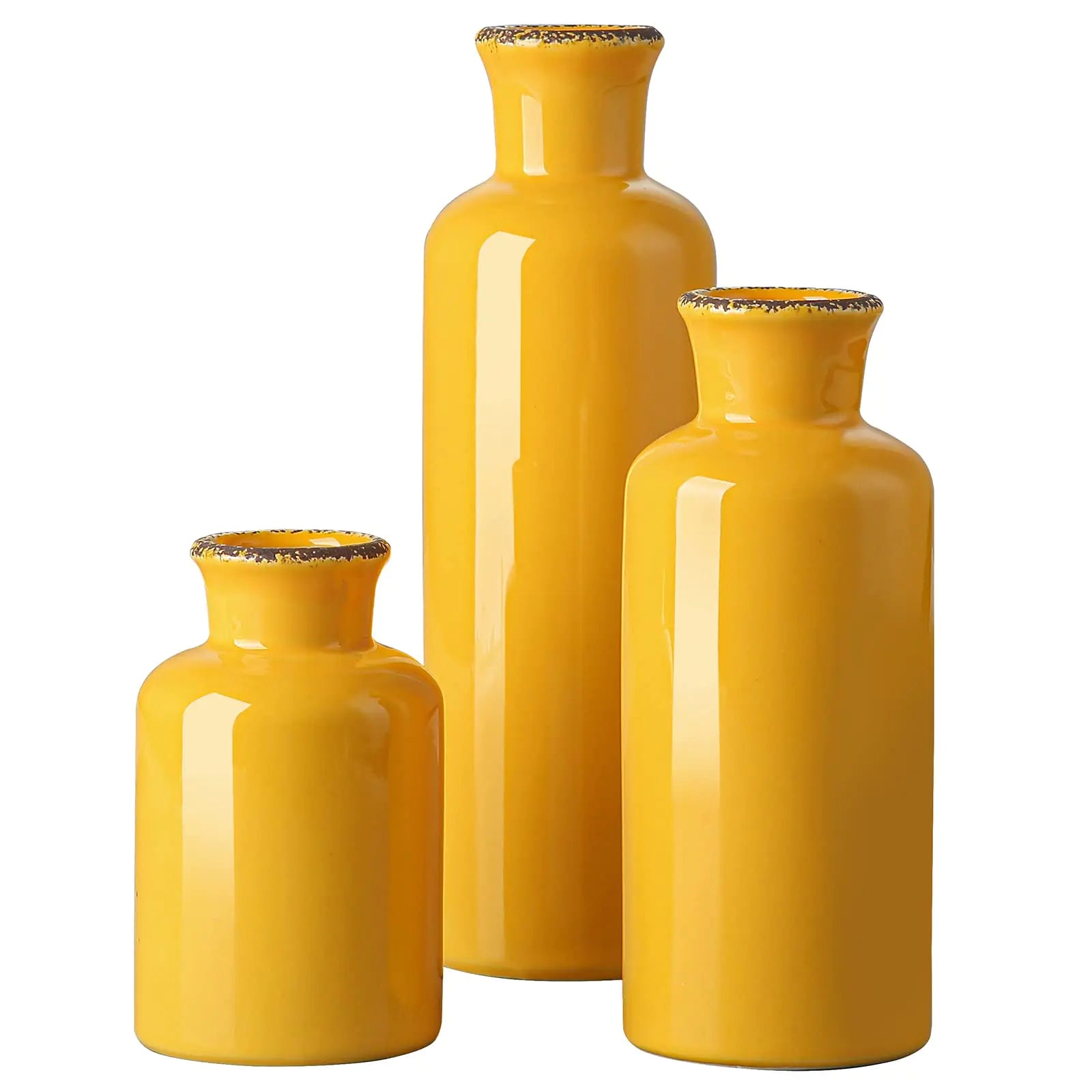 Three yellow vases of different sizes on a white background