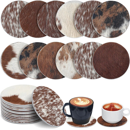 Set of cowhide pattern coasters with a cup of coffee and a mug on a white background